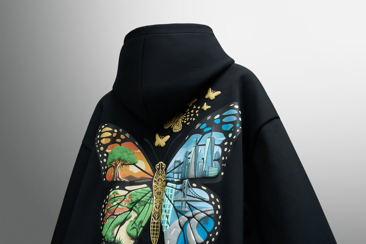 GRITMONK METAMORPH black hoodie: angled back view, butterfly artwork